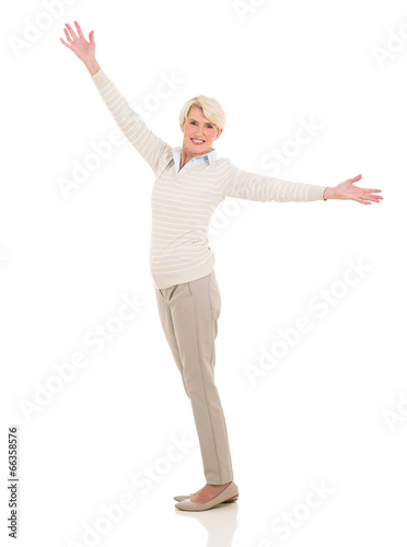 mature woman with arms open
