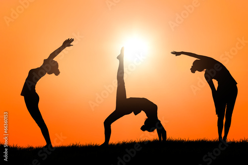 Fototapeta Naklejka Na Ścianę i Meble -  Yoga at sunset