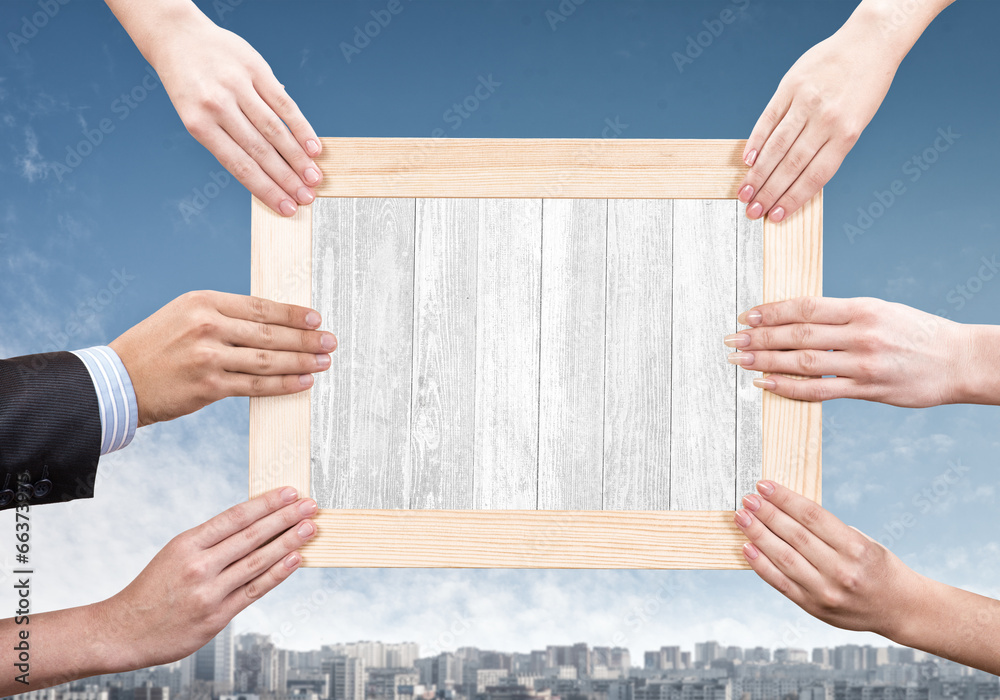 Hands holding frame Hands holding frame