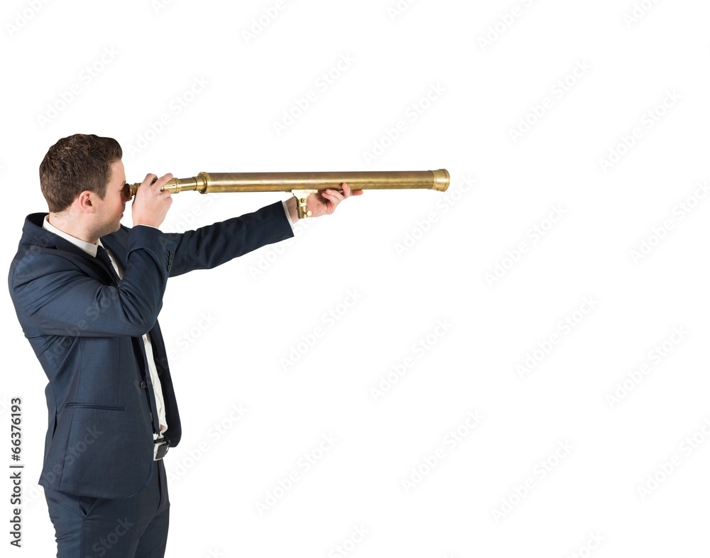 Businessman standing and looking through telescope