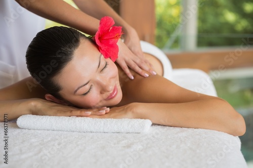 Brunette enjoying a peaceful massage