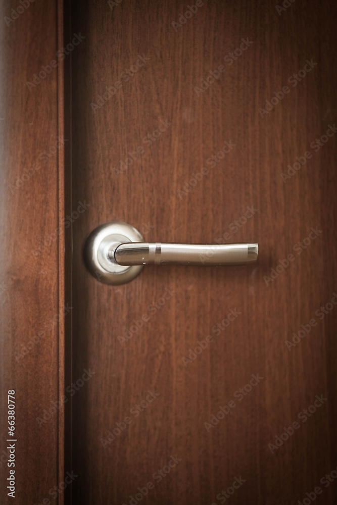 the part of wooden door with metal handle the part of wooden door with metal handle