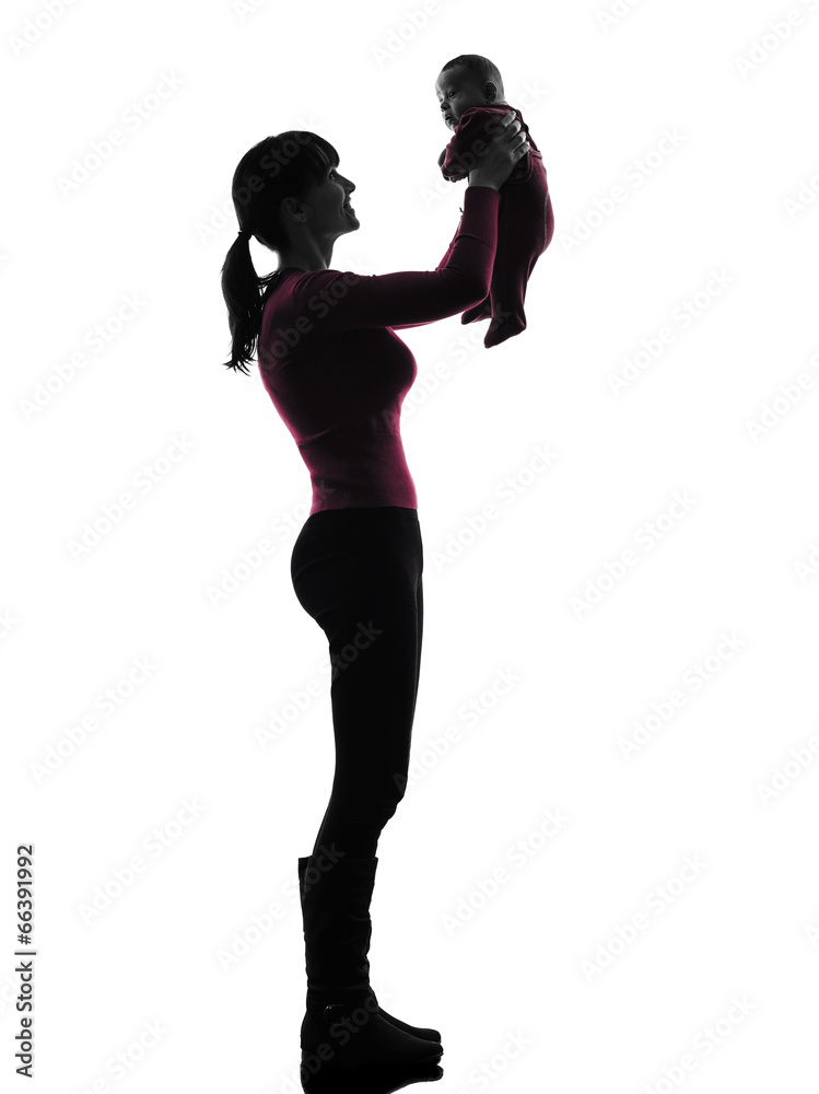 woman mother holding baby silhouette