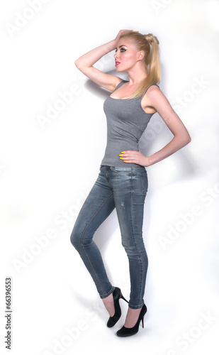 A slim girl in studio, makeup in oriental style, isolate.