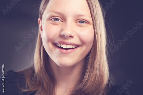 Teen girl laughing