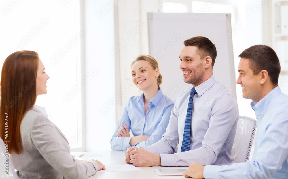 smiling businesswoman at interview in office smiling businesswoman at interview in office