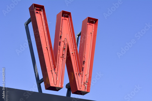 W letter Neon sign red photo