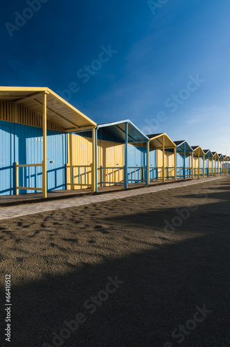 Colored cabins on the beach