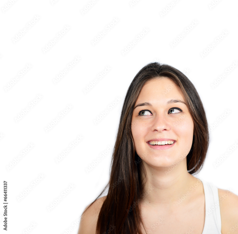 Portrait of beautiful girl thinking and looking up against white Portrait of beautiful girl thinking and looking up against white