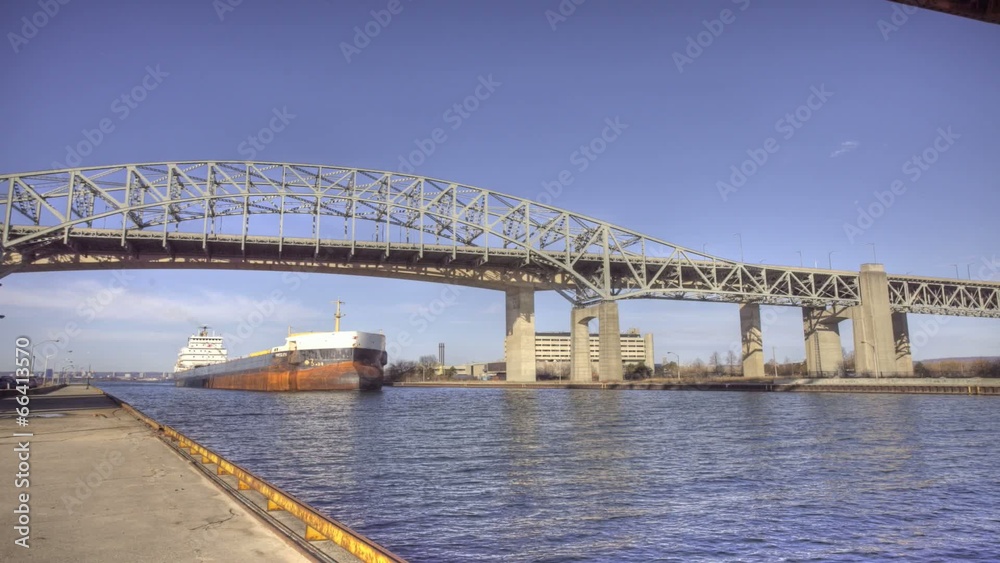 A lake freighter moves past in this timelapse A lake freighter moves past in this timelapse
