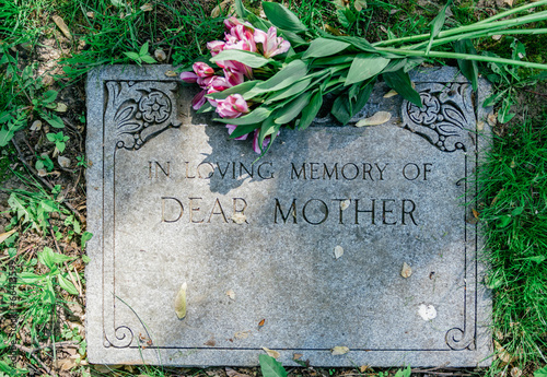 Flowers on Mothers Grave Marker