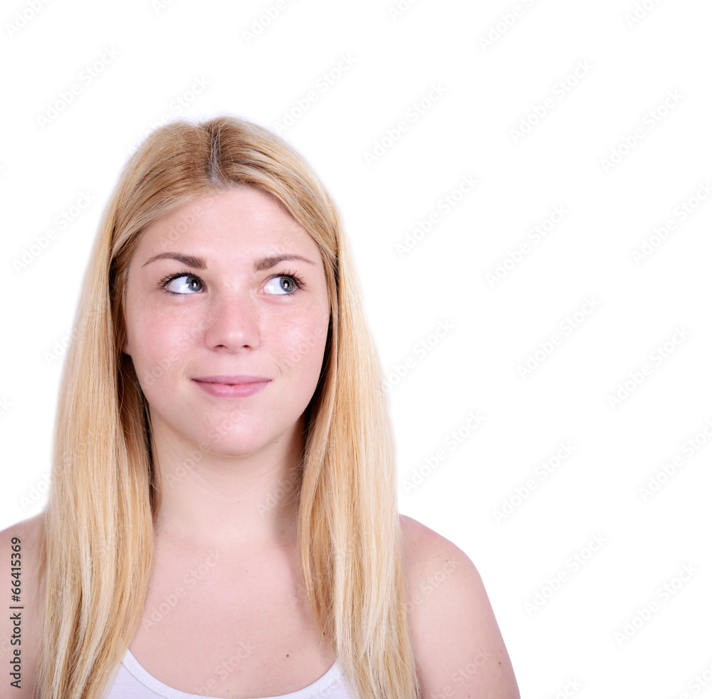 Portrait of beautiful girl looking up against white background Portrait of beautiful girl looking up against white background