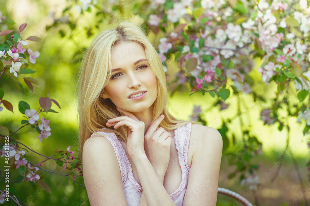 Beautiful spring girl in blooming tree Beautiful spring girl in blooming tree