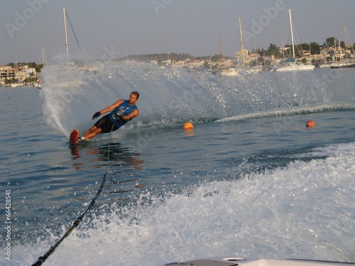 man waterskiing slalom on sea in Greece photo