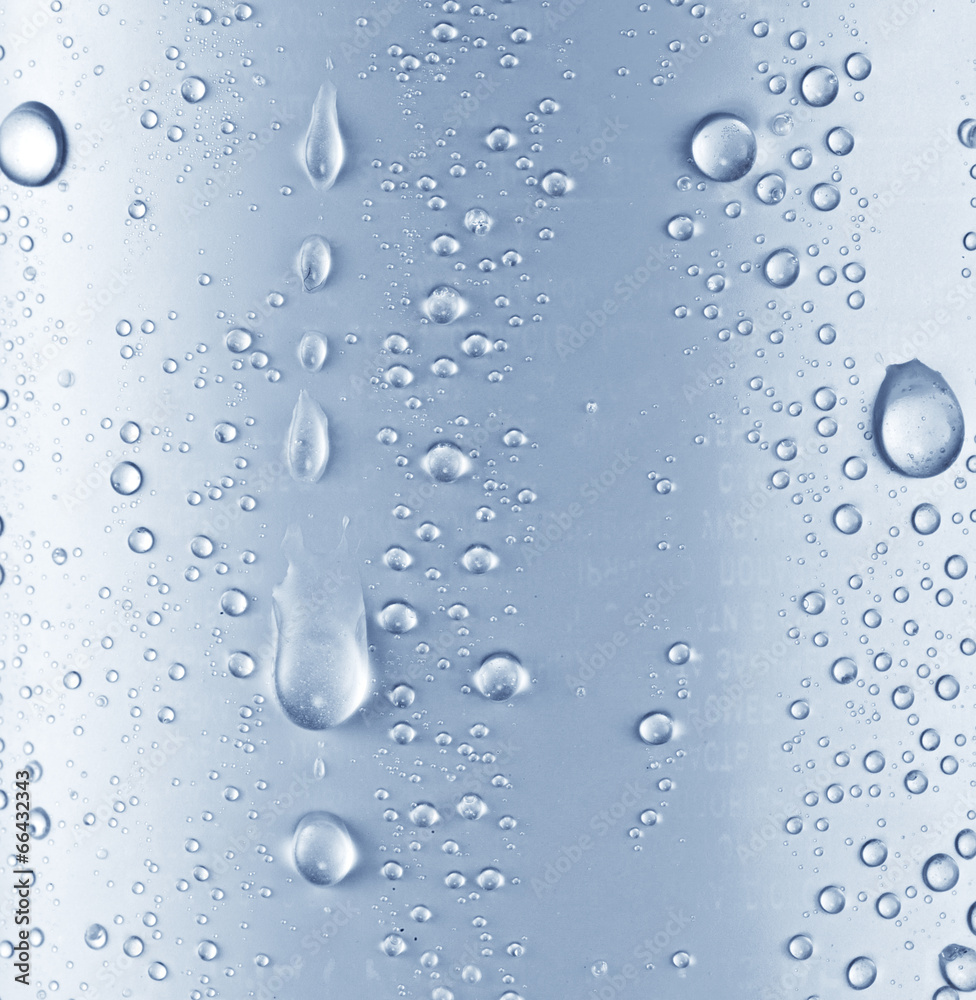 Water drops over blue glass background.