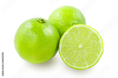 Two whole limes and lime slice