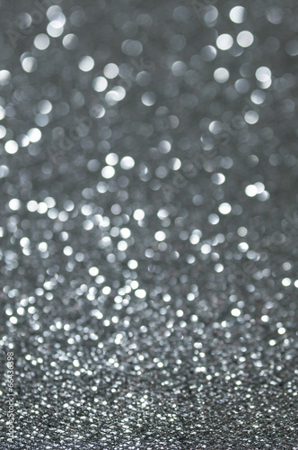 defocused abstract black silver lights background