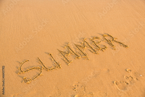Word summer on the yellow sandy beach © len44ik