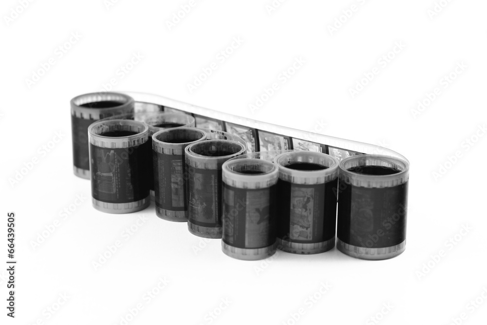 twisted film strip roll on white background twisted film strip roll on white background