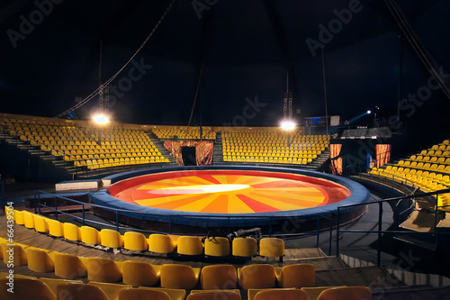 circus ring and chairs for people