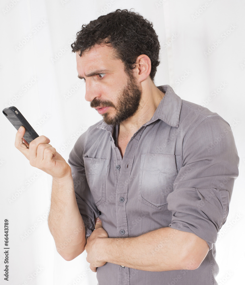 man looking at a phone