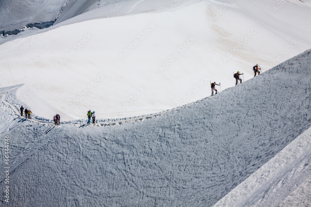 Mont Blanc, Chamonix, French Alps. France. - tourists climbing u