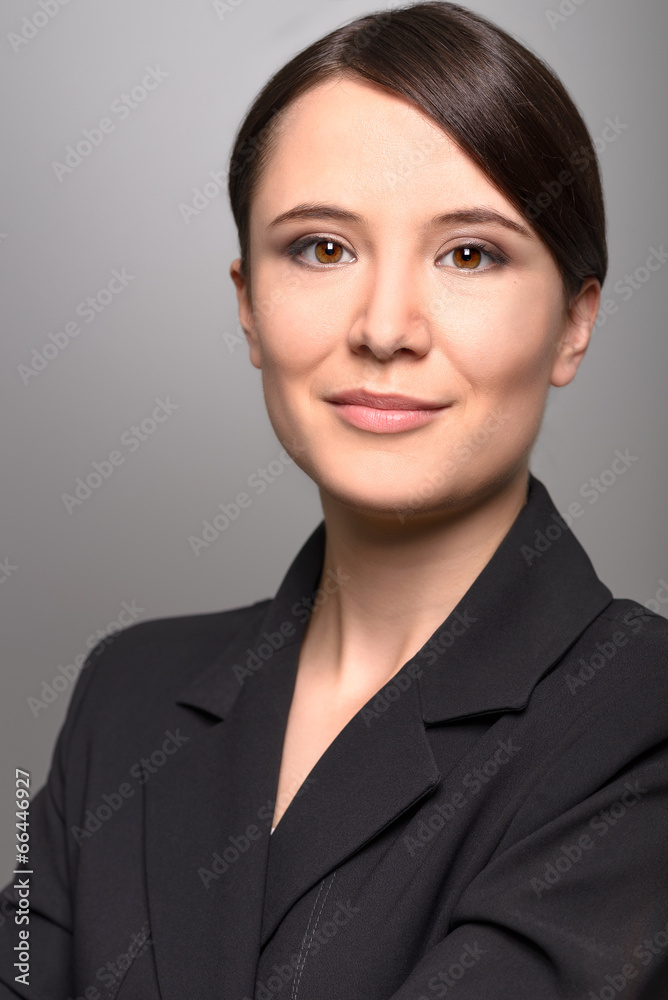 Geschäftsfrau mit einem freundlichen Ausdruck Geschäftsfrau mit einem freundlichen Ausdruck