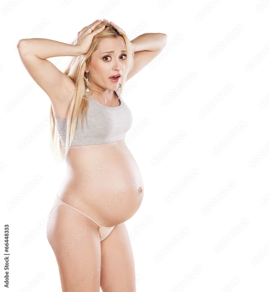 shocked pregnant woman on white background shocked pregnant woman on white background