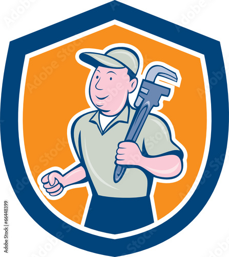 Plumber Holding Monkey Wrench Shield Cartoon