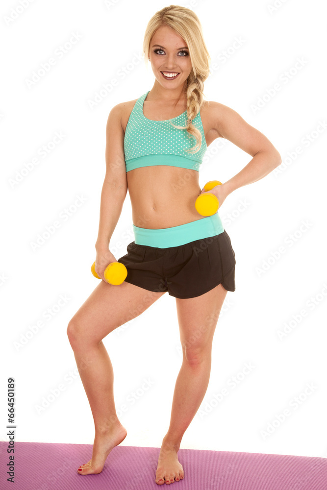 blond woman fitness bra blue yellow weights stand blond woman fitness bra blue yellow weights stand