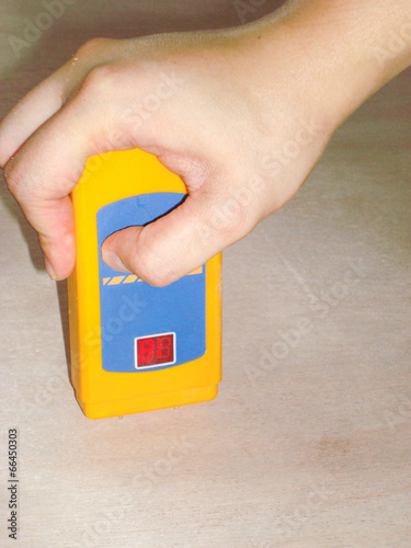 Worker Measuring Level of Moisture Density for Quality Assurance
