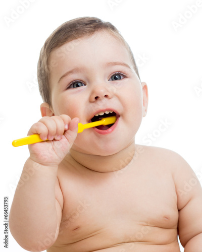 baby cleaning teeth and smiling, isolated on white background