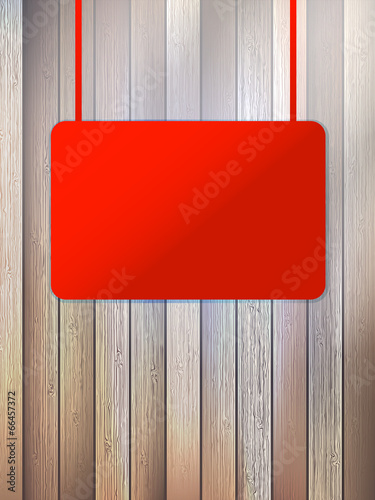 Blank red signboard on aged wooden wall. EPS10