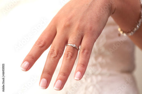 Engagement ring. French manicure.