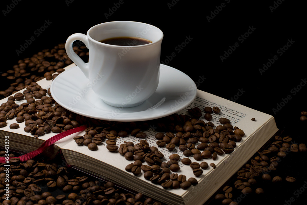 Coffee cup with old book Coffee cup with old book