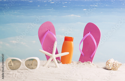 flip-flops and starfish with beach accessories