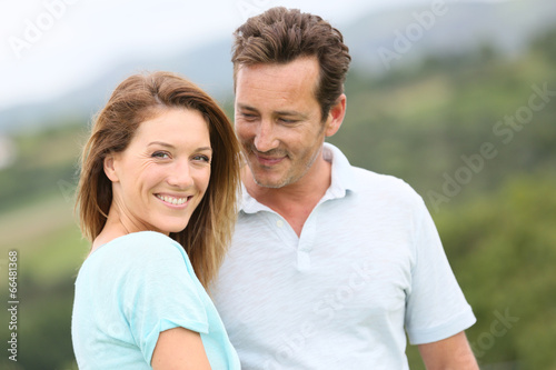 Portrait of loving couple in countryside