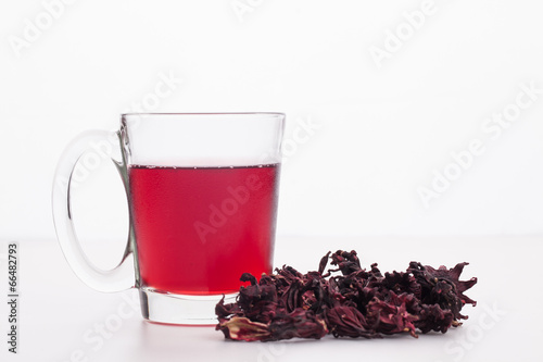 pile of Roselle and juice on white background