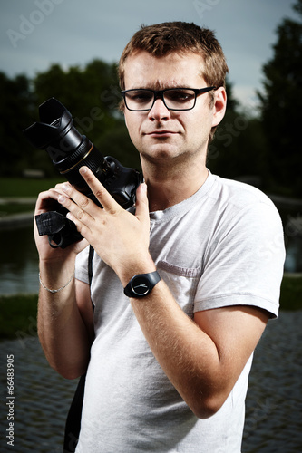 Photographer with camera at work