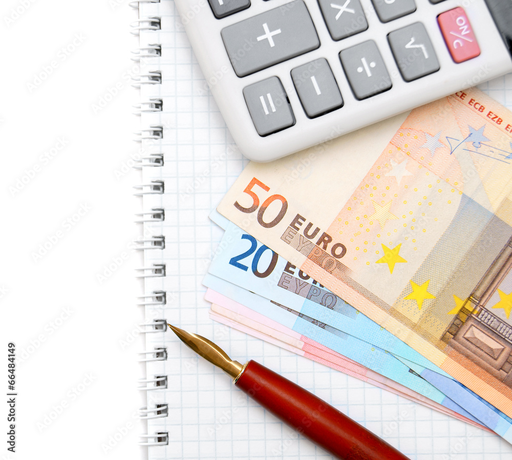 Pen, banknotes and the calculator on a notebook. Pen, banknotes and the calculator on a notebook.