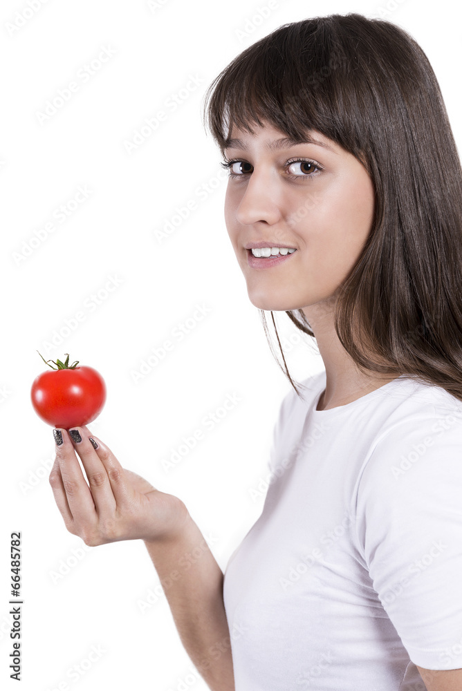 Young Woman Eating Tomatoes. Portrait of smiling Young Woman Eating Tomatoes. Portrait of smiling
