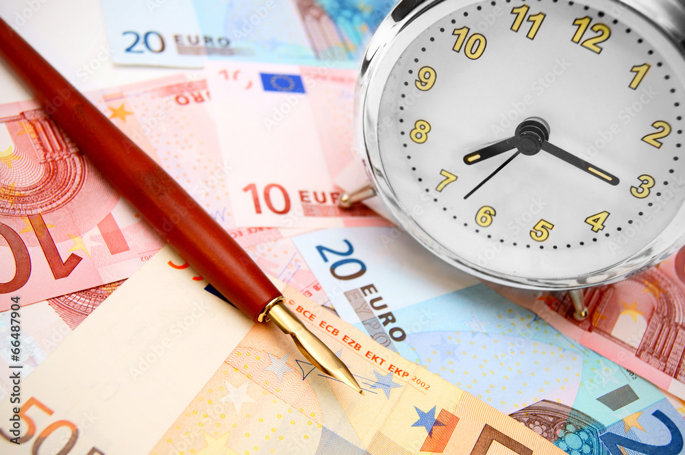 Pen and an alarm clock for euro banknotes. Pen and an alarm clock for euro banknotes.