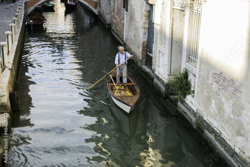 Man on a boat in Venice © Deyan Georgiev