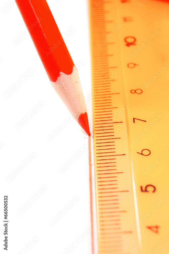 Pencil and ruler on a white background. Pencil and ruler on a white background.