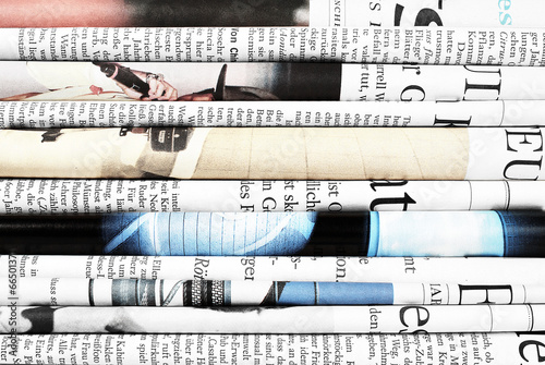 Folded newspapers