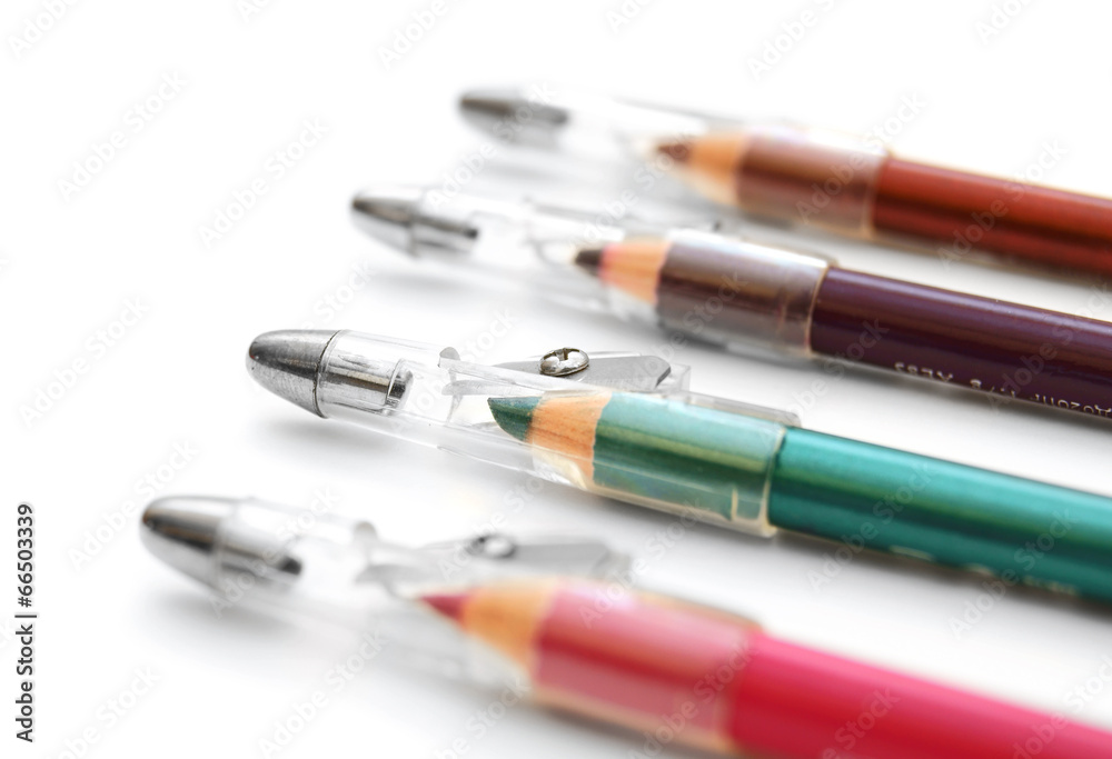 Cosmetic pencils. On a white background.