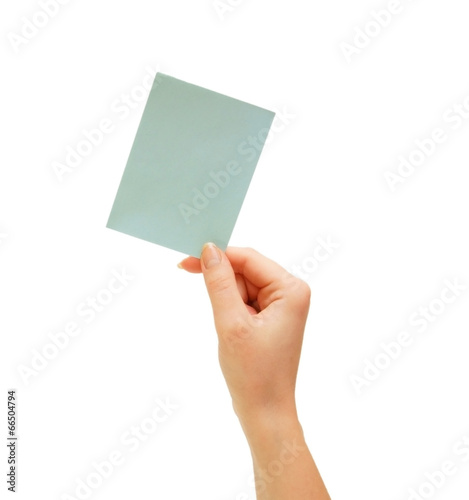 Hand and sticker. On a white background.