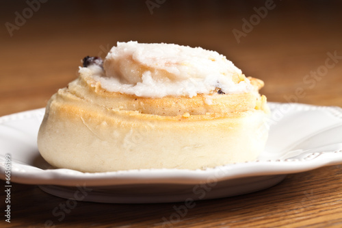 Macro shot of a homemade freshly baked hot cinnamon roll