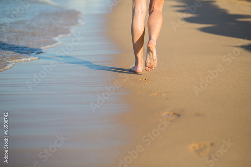 Woman walking on the beach