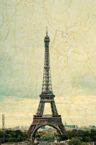 famous Eiffel Tower in Paris, France. Grunge style photo.